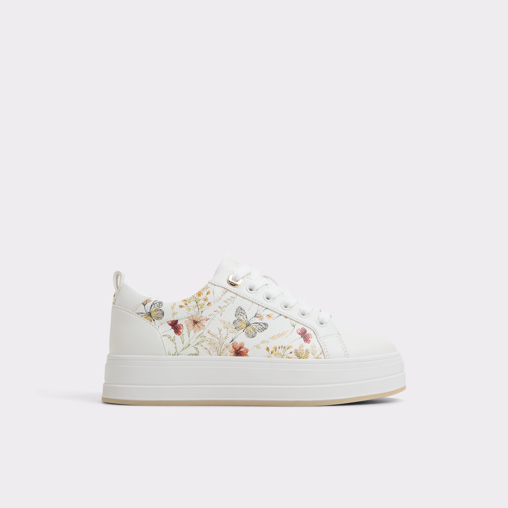A white sneaker with a flower and butterfly design