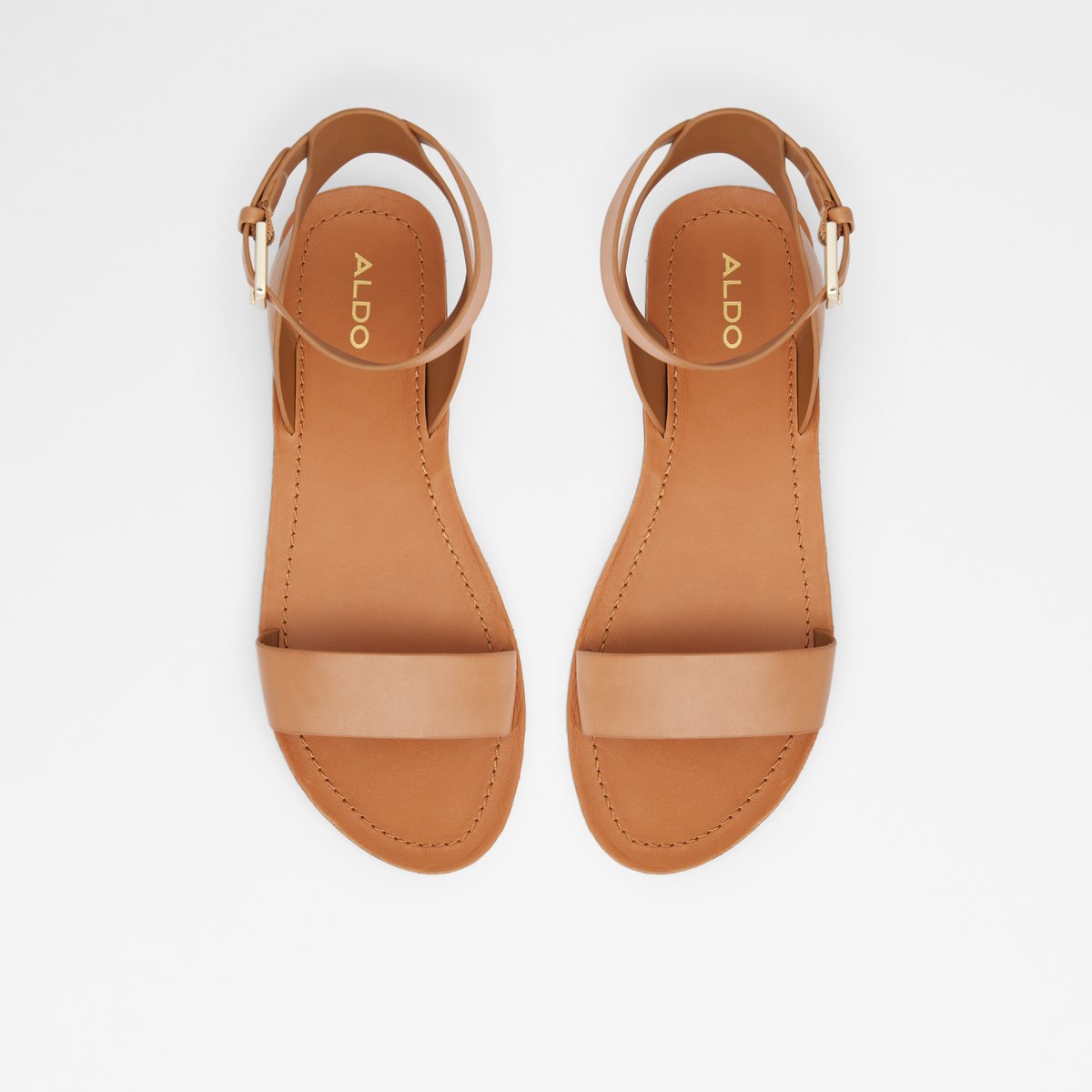 Vagabond Tia cross strap leather flat sandals in cognac | ASOS