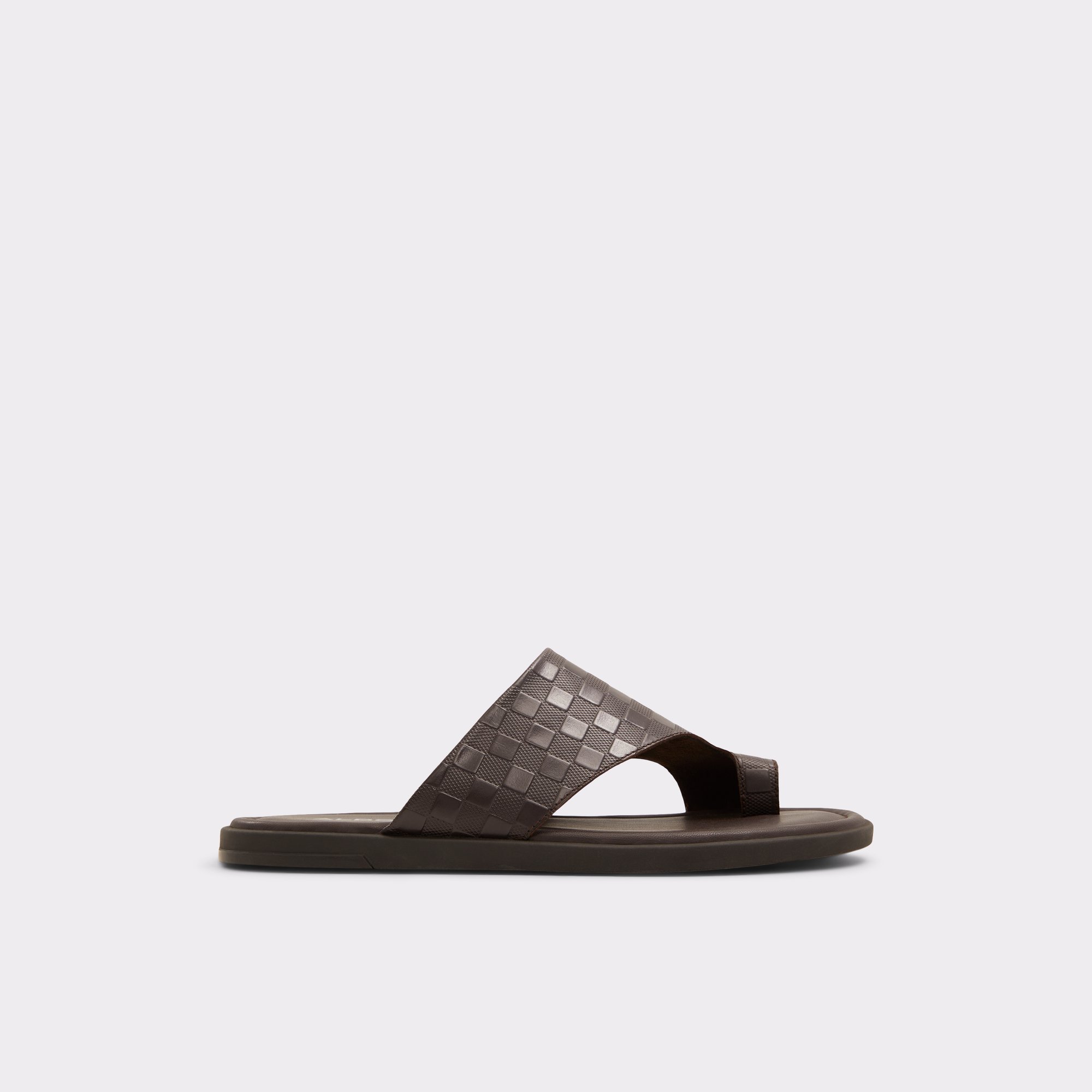 A dark brown sandal